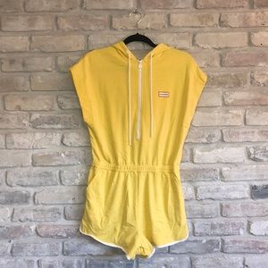 Hunter sleeveless jumpsuit with hood and zipper detail